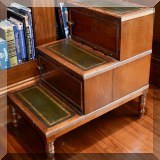 F24. Wood and leather library stairs. 27”h x 18”w x 28”d 